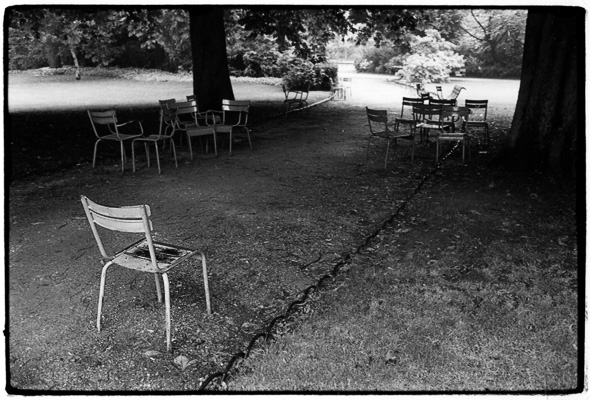 Chairs in Jardin du Luxembourg, 1984-87. 15 photographs, possibly more about human relations than about some chairs in a parc in Paris